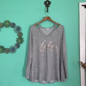 Fashion blogger. cold shoulder. high low top.